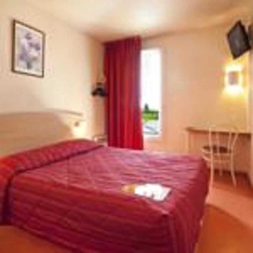 فندق بريمير كلاس إفرو المظهر الخارجي الصورة A typical room at a hotel